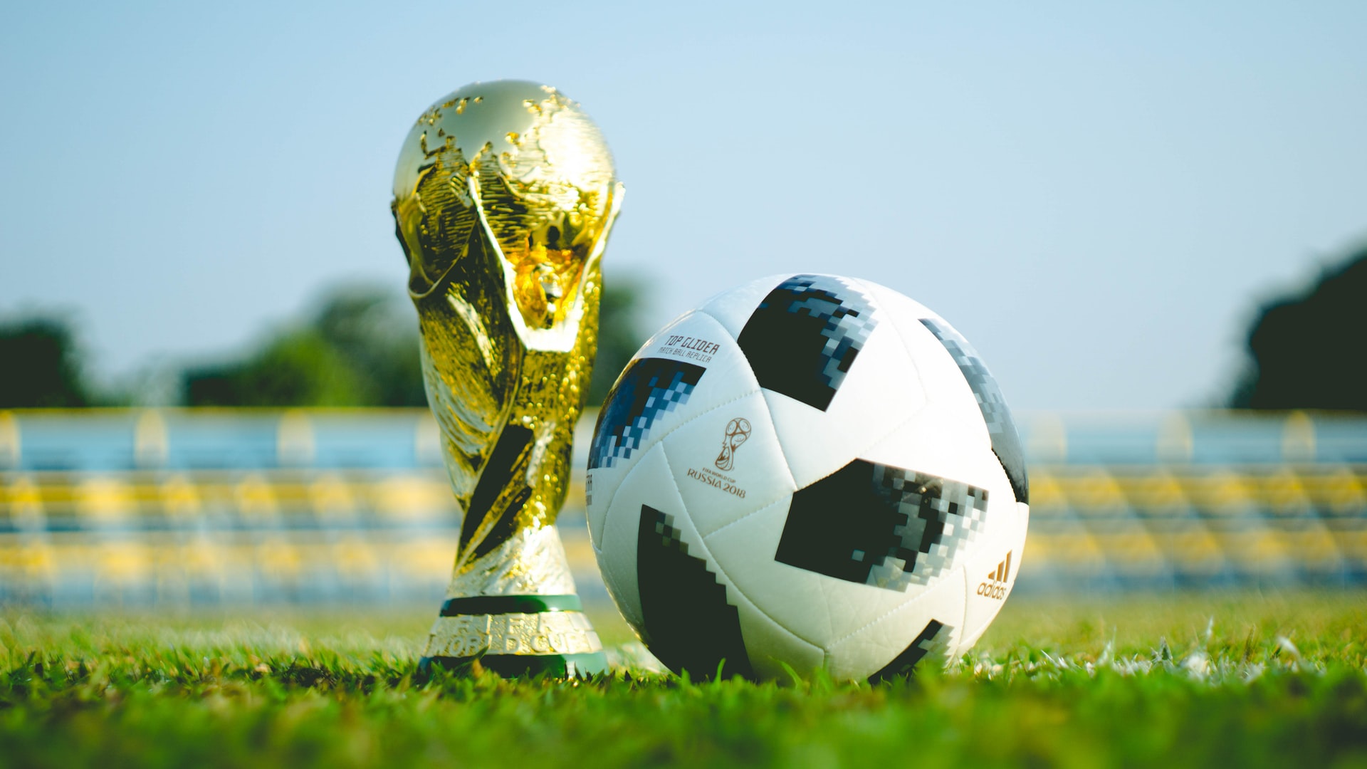 soccer ball and trophy